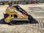 Back of new Mini Skid Steer,Side of new Boxer,New Boxer Mini Skid Steer in yard